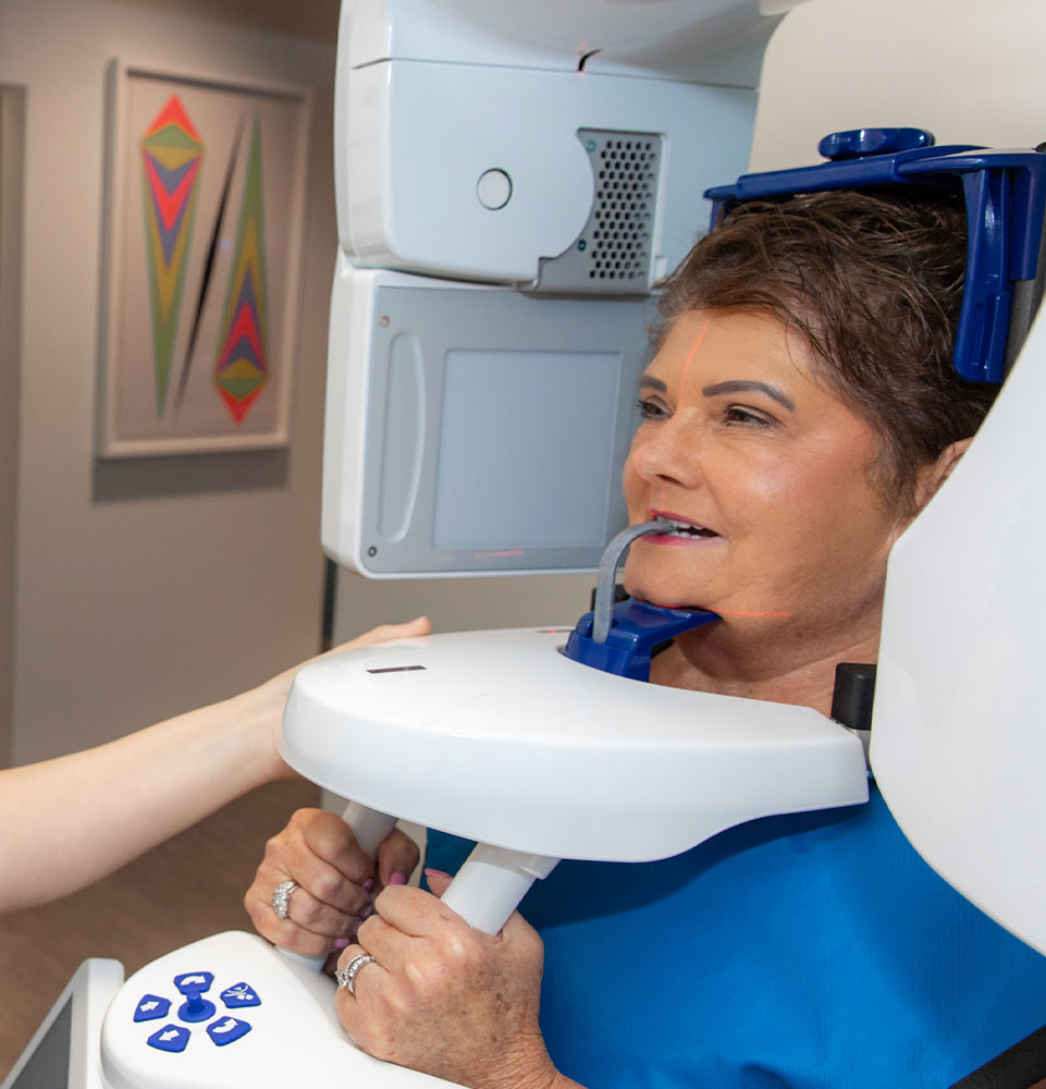 loose dneture patient smiling